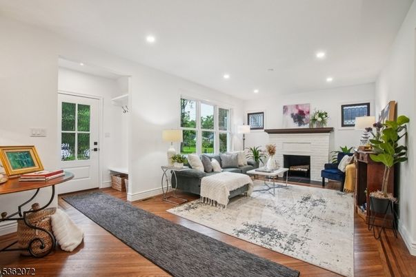 Fireplace, Interior, Living room, Recessed Lighting, Wood Texture Flooring
