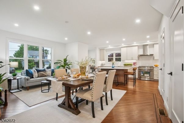 Dining room, Interior, Kitchen, Living room, Recessed Lighting, Stainless Steel Appliances, Wood Texture Flooring