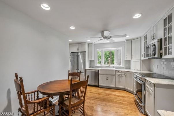 Dining room, Interior, Kitchen, Recessed Lighting, Stainless Steel Appliances, Wood Texture Flooring