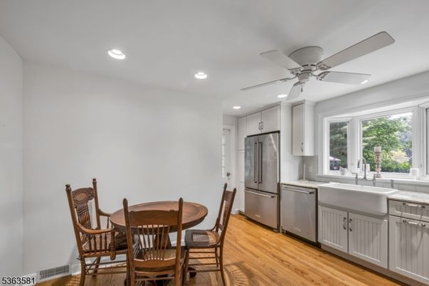 Dining room, Interior, Kitchen, Recessed Lighting, Stainless Steel Appliances, Wood Texture Flooring