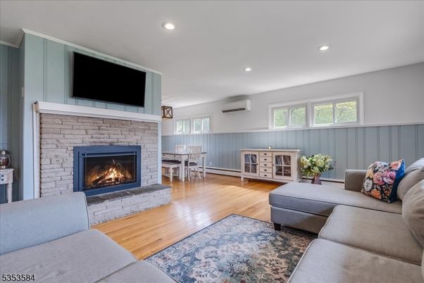 Dining room, Fireplace, Interior, Living room, Recessed Lighting, Wood Texture Flooring
