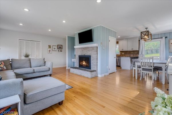 Dining room, Fireplace, Interior, Kitchen, Living room, Recessed Lighting, Wood Texture Flooring