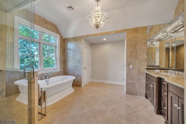 Bathroom, Chandelier, Free Standing Baths, Glass Shower, Interior, Recessed Lighting