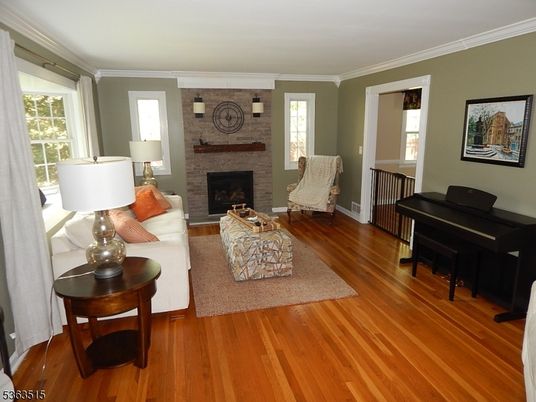 Fireplace, Interior, Living room, Piano, Stone Walls, Wood Texture Flooring