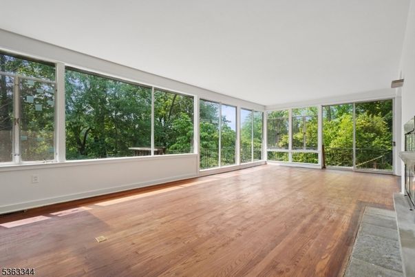Empty room, Fireplace, Interior, Sun Room, Wood Texture Flooring