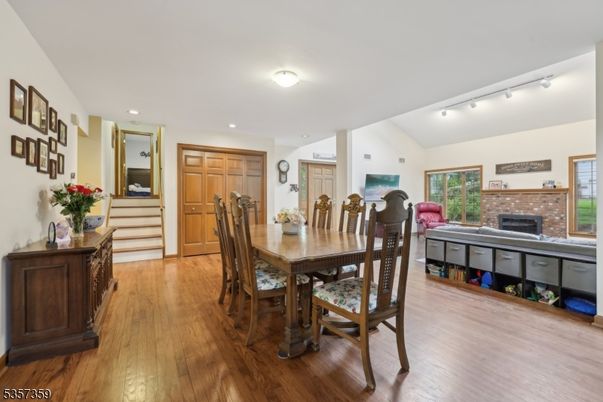 Dining room, Fireplace, Interior, Recessed Lighting, Wood Texture Flooring