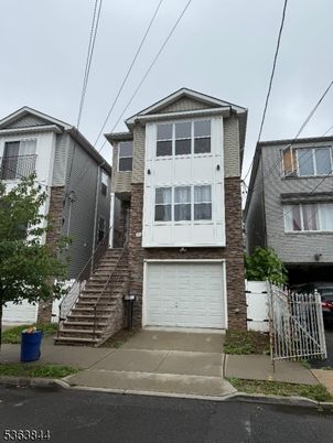 Attached, Exterior, Facade, Brick Facade, American Craftsman
