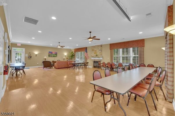 Dining room, Fireplace, Interior, Living room, Recessed Lighting, Stone Walls