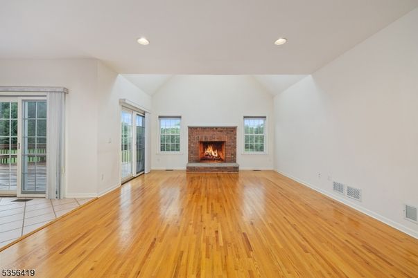 Empty room, Fireplace, Interior, Recessed Lighting, Wood Texture Flooring