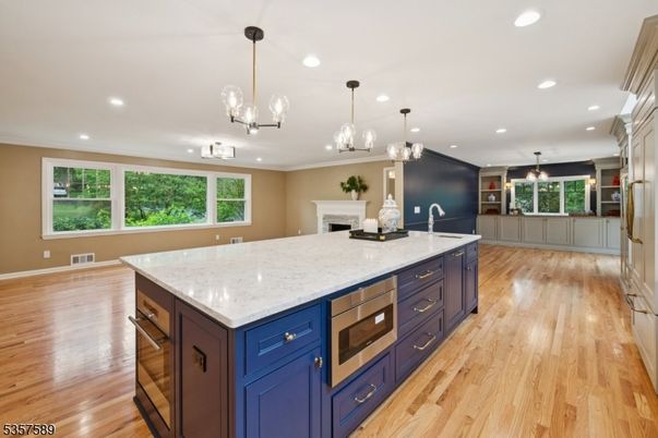 Fireplace, Interior, Kitchen, Pendant Lights, Recessed Lighting, Wood Texture Flooring