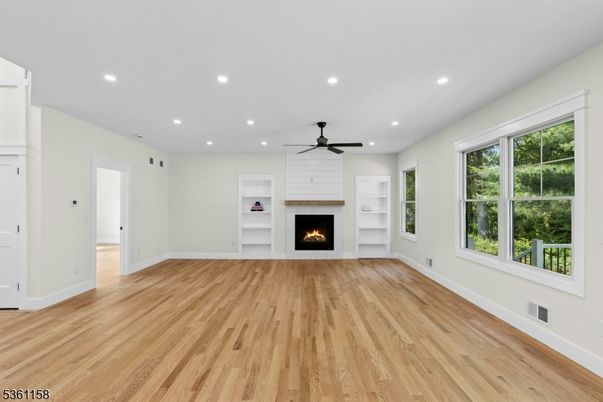 Empty room, Fireplace, Interior, Recessed Lighting, Wood Texture Flooring