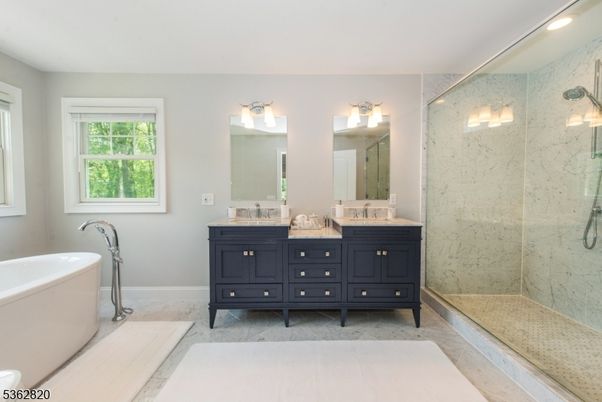 Bathroom, Dual Sink Vanities, Free Standing Baths, Glass Shower, Interior, Marble, Marble Walls, Recessed Lighting