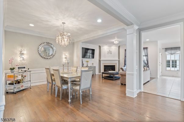 Chandelier, Dining room, Fireplace, Interior, Recessed Lighting, Wood Texture Flooring