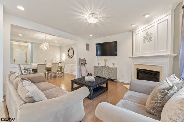 Chandelier, Dining room, Fireplace, Interior, Living room, Recessed Lighting, Wood Texture Flooring