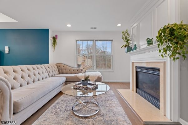 Fireplace, Interior, Living room, Recessed Lighting, Wood Texture Flooring
