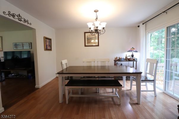 Chandelier, Dining room, Interior, Wood Texture Flooring