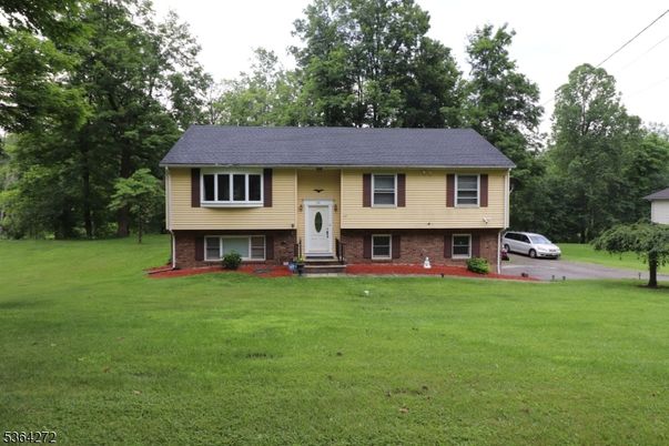 Backyard, Exterior, Facade, Brick Facade, Raised Ranch