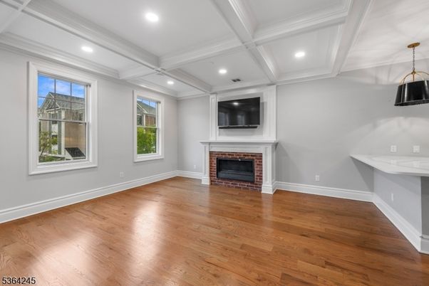Empty room, Fireplace, Interior, Pendant Lights, Recessed Lighting, Wood Texture Flooring