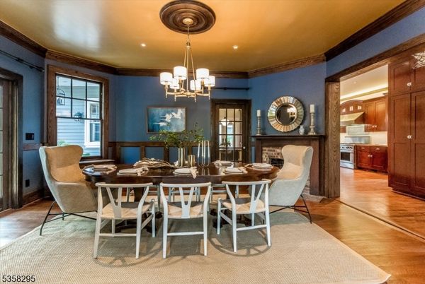 Chandelier, Dining room, Fireplace, Interior, Recessed Lighting, Wood Texture Flooring