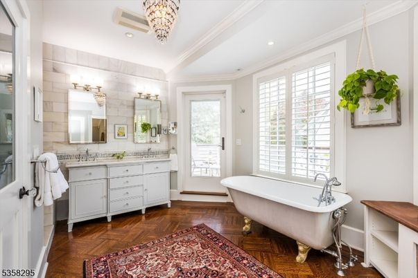 Bathroom, Dual Sink Vanities, Free Standing Baths, Interior, Recessed Lighting, Wood Texture Flooring