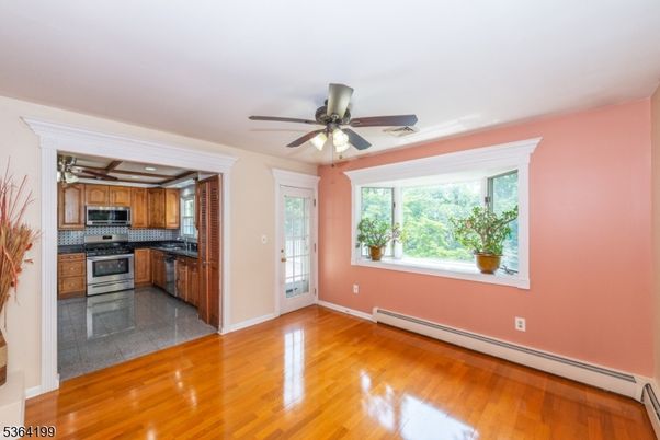 Empty room, Interior, Kitchen, Stainless Steel Appliances, Wood Texture Flooring