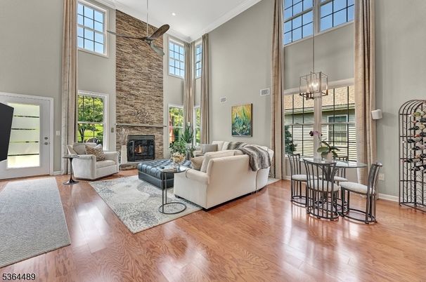 Dining room, Fireplace, Interior, Living room, Pendant Lights, Recessed Lighting, Wood Texture Flooring