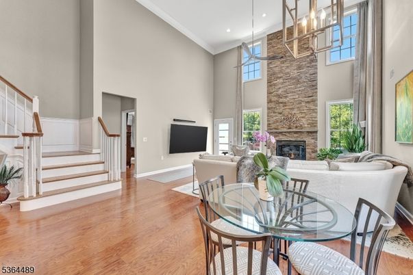 Dining room, Fireplace, Interior, Living room, Pendant Lights, Recessed Lighting, Stone Walls, Wood Texture Flooring