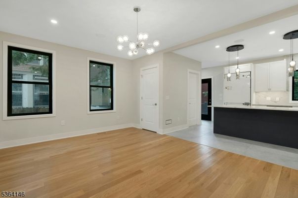 Empty room, Interior, Kitchen, Pendant Lights, Recessed Lighting, Wood Texture Flooring
