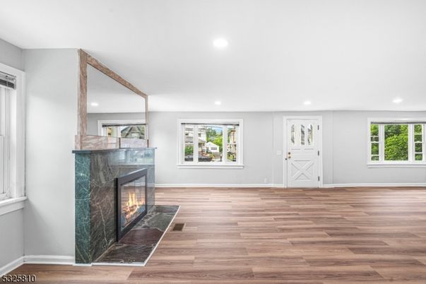 Empty room, Fireplace, Interior, Recessed Lighting, Wood Texture Flooring