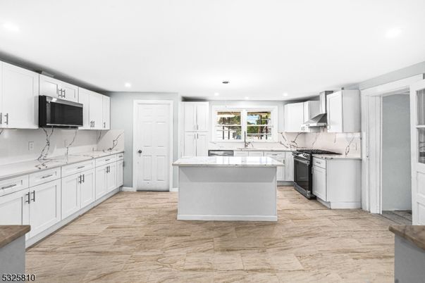 Interior, Kitchen, Marble Walls, Recessed Lighting, Wood Texture Flooring