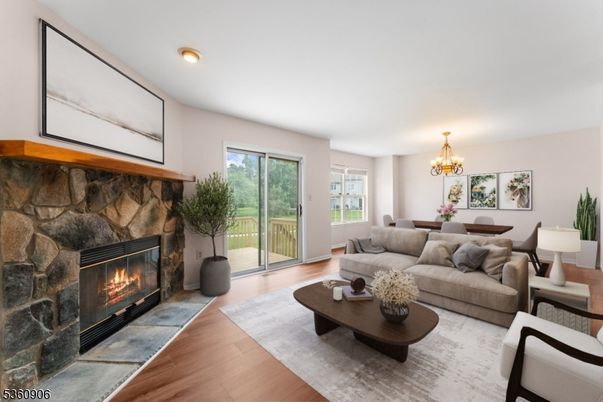 Chandelier, Dining room, Fireplace, Interior, Living room, Recessed Lighting, Wood Texture Flooring