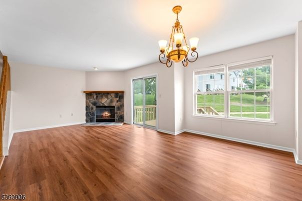 Chandelier, Empty room, Fireplace, Interior, Wood Texture Flooring