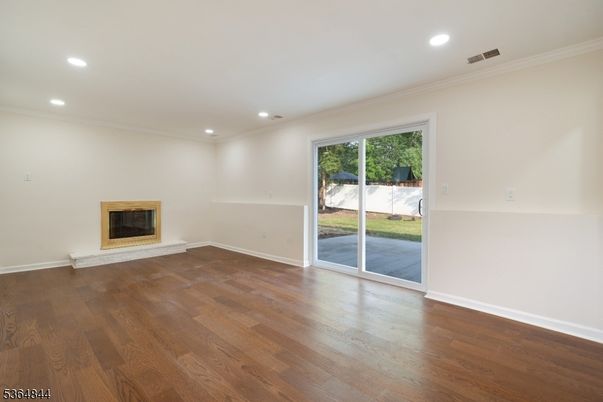 Empty room, Fireplace, Interior, Recessed Lighting, Wood Texture Flooring
