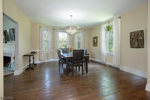 Chandelier, Dining room, Fireplace, Interior, Wood Texture Flooring