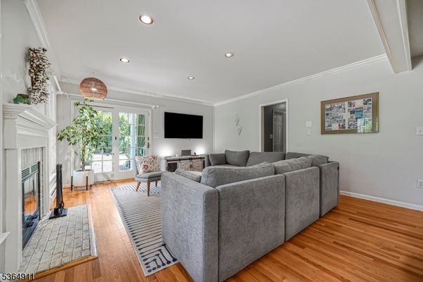 Fireplace, Interior, Living room, Recessed Lighting, Wood Texture Flooring