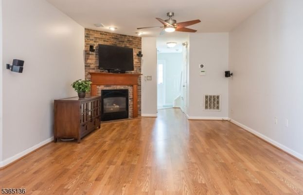 Empty room, Fireplace, Interior, Stone Walls, Wood Texture Flooring