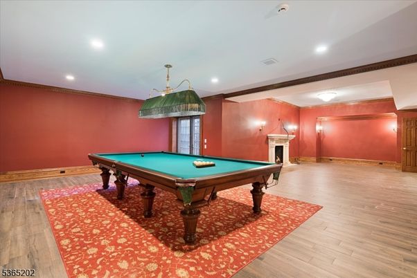 Billiard Table, Fireplace, Game Room, Interior, Recessed Lighting, Wood Texture Flooring