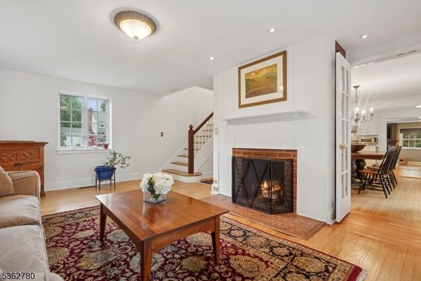 Chandelier, Dining room, Fireplace, Interior, Recessed Lighting, Wood Texture Flooring