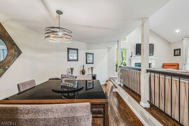Dining room, Fireplace, Interior, Pendant Lights, Recessed Lighting, Wood Texture Flooring