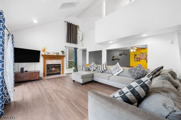 Fireplace, Interior, Living room, Recessed Lighting, Wood Texture Flooring