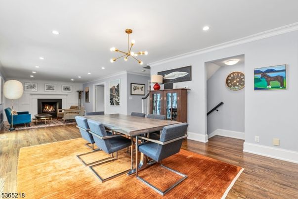 Dining room, Fireplace, Interior, Living room, Pendant Lights, Recessed Lighting, Wood Texture Flooring