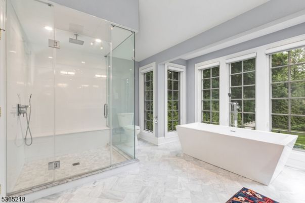 Bathroom, Free Standing Baths, Glass Shower, Interior, Marble, Marble Walls, Recessed Lighting