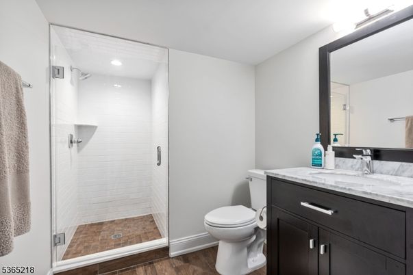 Bathroom, Glass Shower, Interior, Recessed Lighting, Wood Texture Flooring