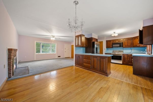 Chandelier, Interior, Kitchen, Stainless Steel Appliances, Wood Texture Flooring