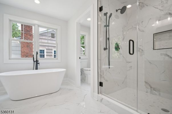 Bathroom, Free Standing Baths, Glass Shower, Interior, Marble, Marble Walls, Recessed Lighting