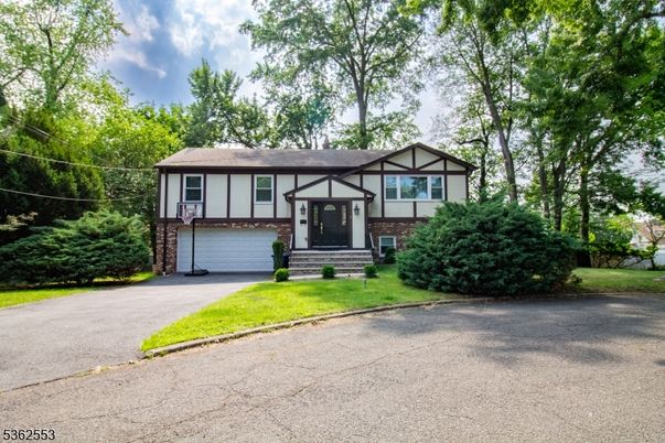Attached, Exterior, Facade, Brick Facade, Tudor Revival