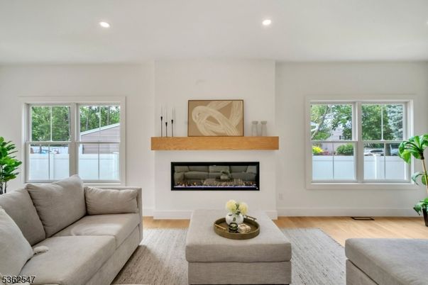 Fireplace, Interior, Living room, Recessed Lighting, Wood Texture Flooring