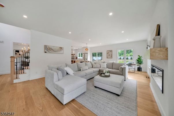 Dining room, Fireplace, Interior, Living room, Pendant Lights, Recessed Lighting, Wood Texture Flooring