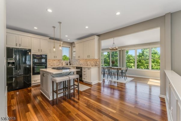 Chandelier, Dining room, Interior, Kitchen, Pendant Lights, Recessed Lighting, Wood Texture Flooring