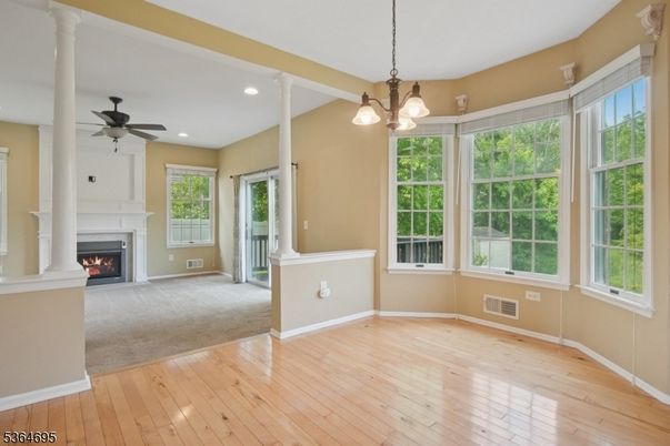 Empty room, Fireplace, Interior, Pendant Lights, Recessed Lighting, Wood Texture Flooring